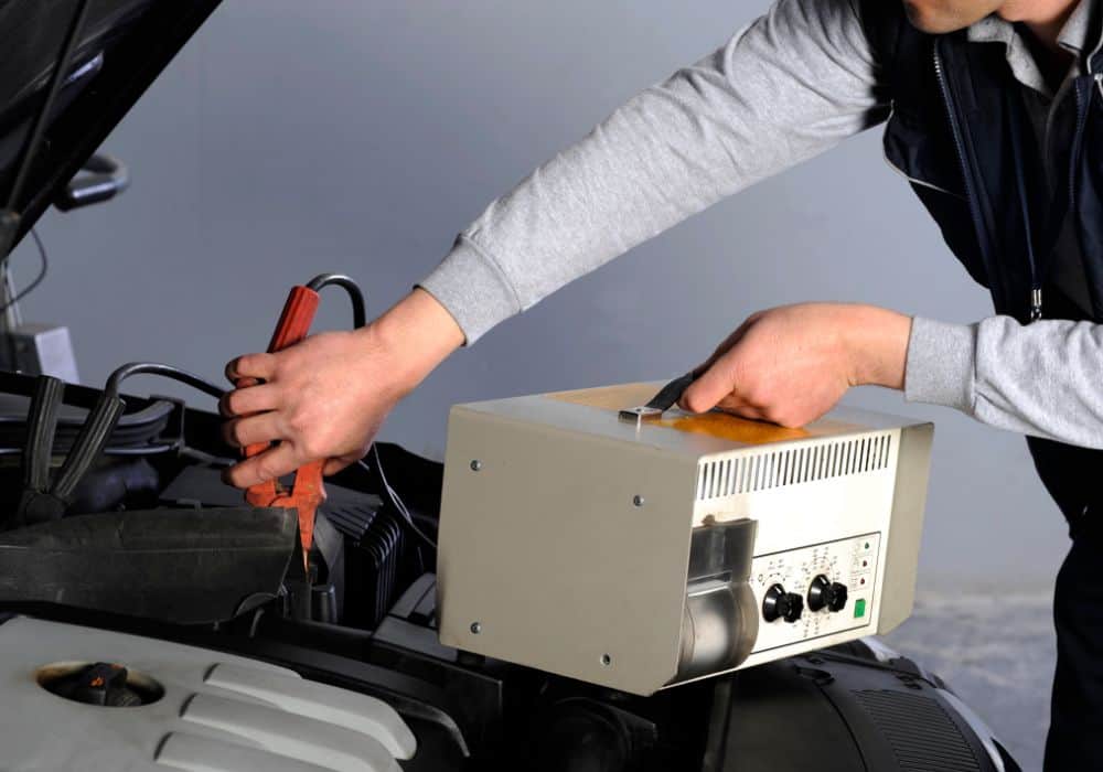 Why does a car battery discharge